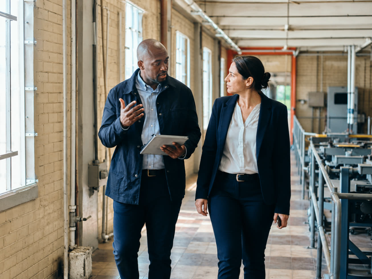 Security risk assessment walkthrough with a client in a professional facility